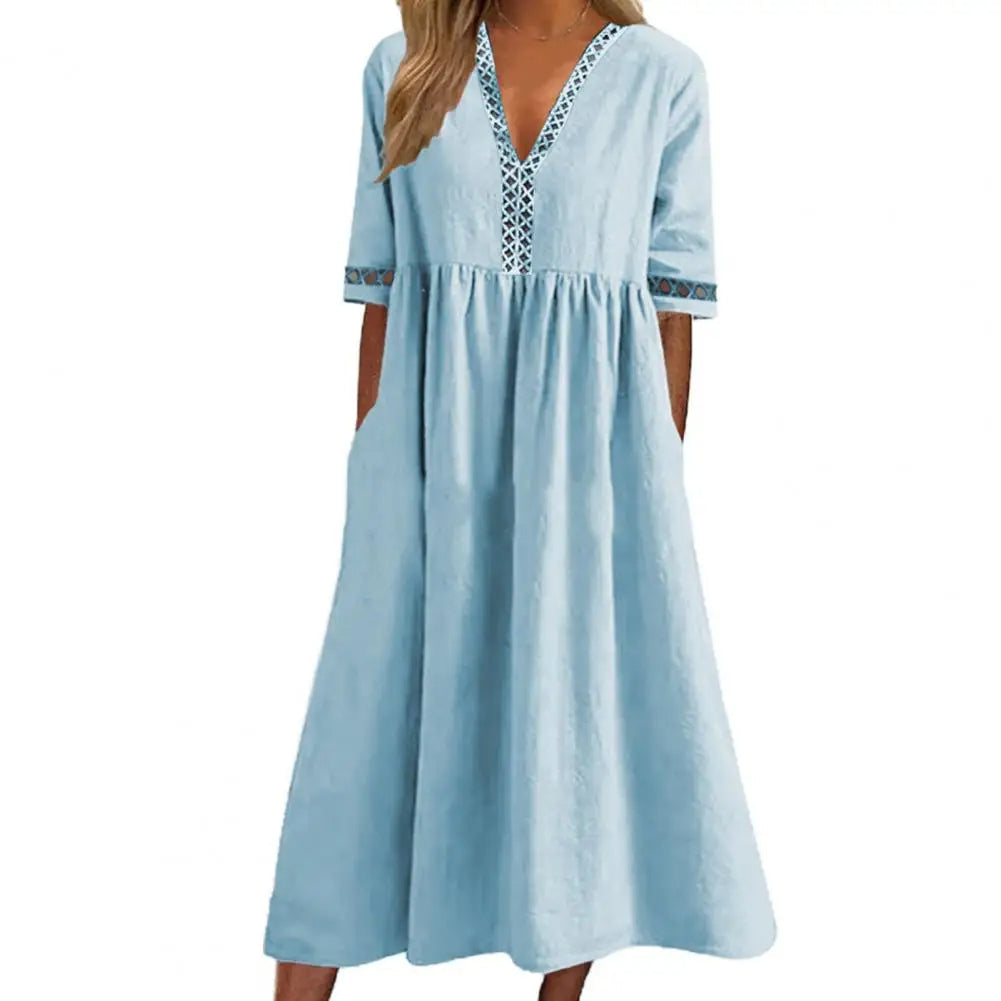 Casual plus size summer midi dress for women. Comfortable, elegant loose fit for various events. Short sleeve design.