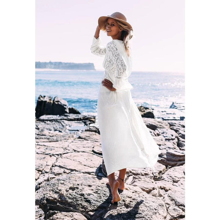 Casual white maxi dress for women, ideal for beach trips & summer fashion. Comfortable & elegant flowy design.