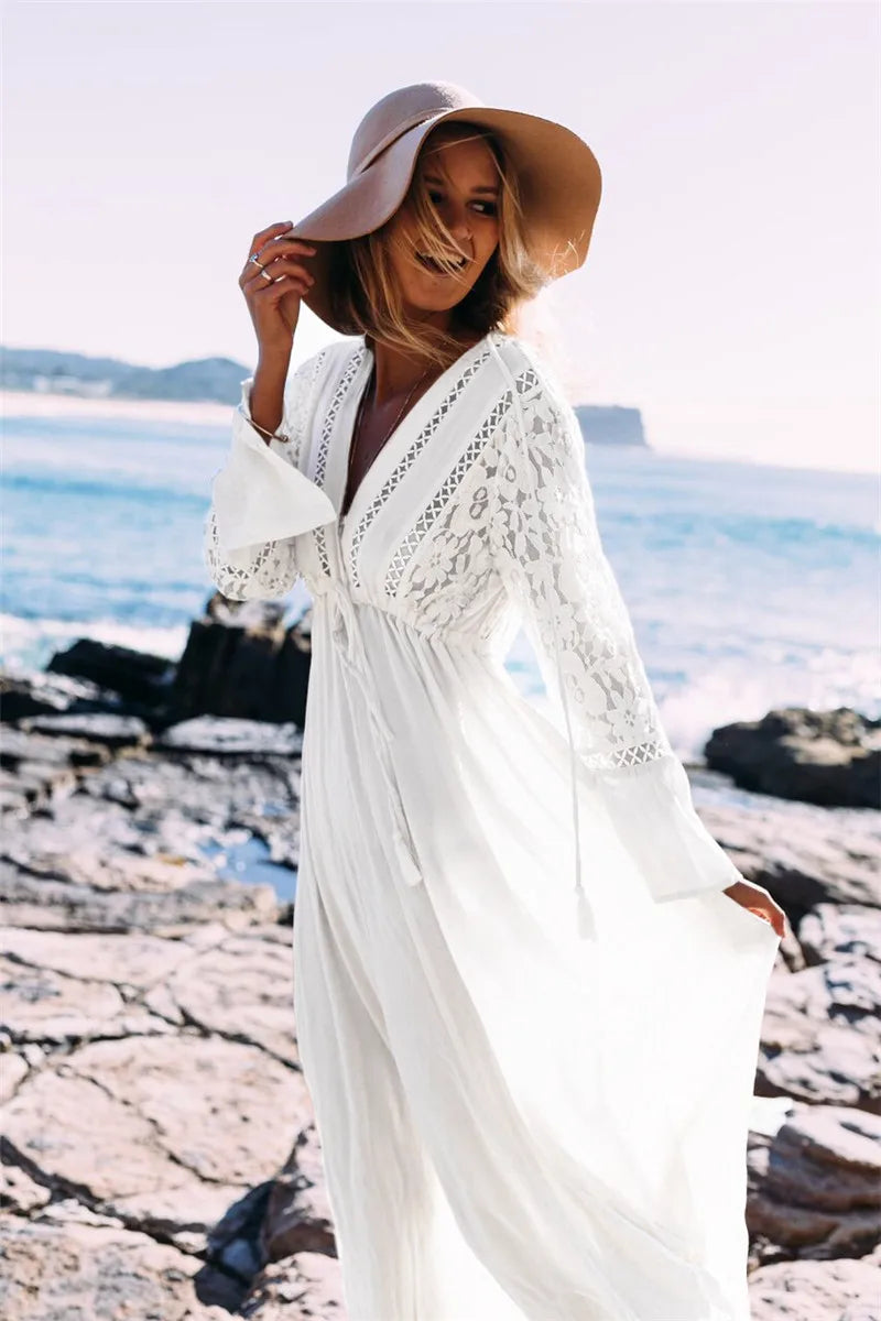 Elegant white maxi dress for women, offering effortless summer comfort. Flowy, casual, and perfect for vacation.