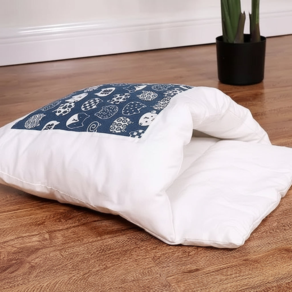 Cozy cat cave bed, a warm pet sleeping bag for indoor cats. Available in navy and purple, for pet comfort.