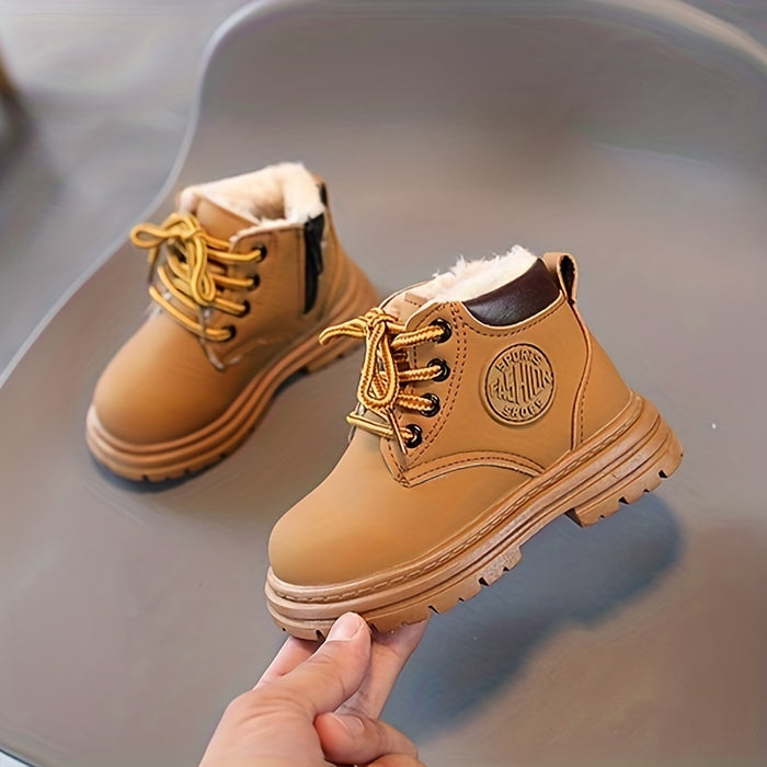 Stylish boys' autumn/winter fashion boots. Waterproof, warm lining, and durable non-slip sole.