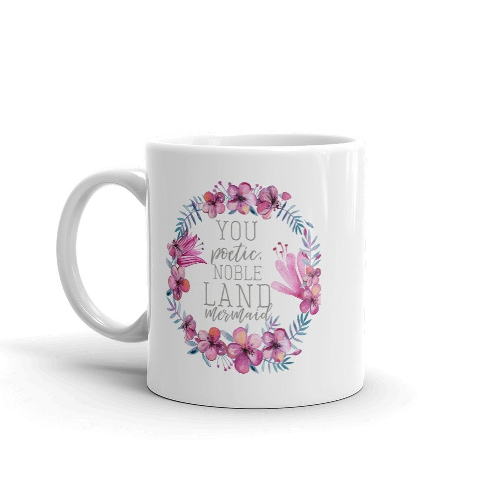 White ceramic coffee mug with floral wreath & inspirational quote print, perfect for tea or coffee drinkware.
