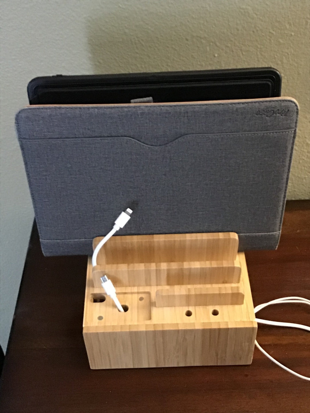 Keep your tech neat with this 5-port bamboo universal charging station & device organizer, perfect for any desk.
