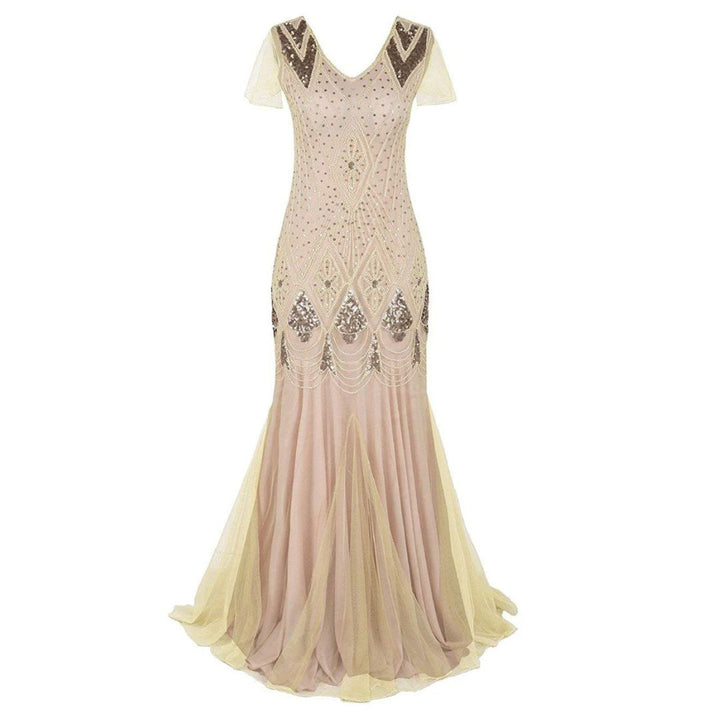 Floor-length women's flapper dress, fully embellished with sparkling sequins, capturing Art Deco 1920s style.