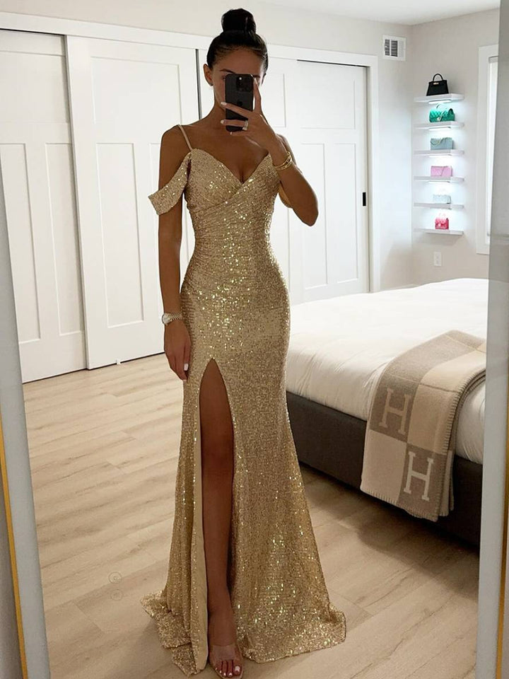 Chic champagne sequin V-neck maxi dress with a sophisticated slit, ideal for wedding guests & party nights.