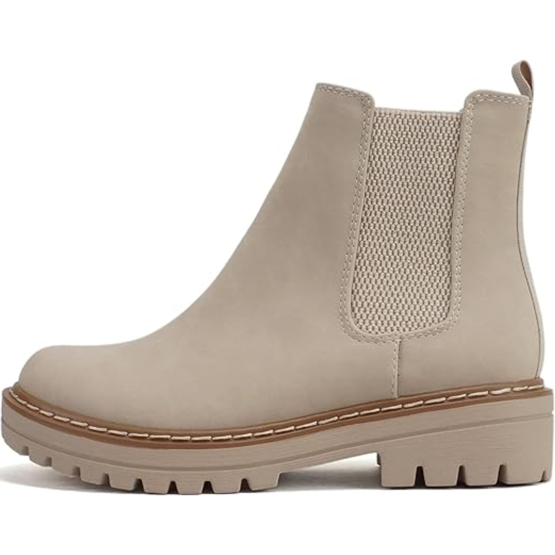 Chic women's low heel Chelsea boots, comfortable ankle design ideal for everyday style and elegant winter outfits.