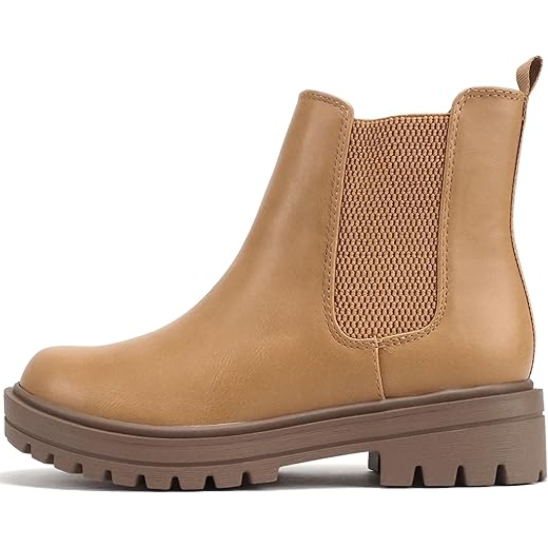 Close-up of elastic side panel on women's Chelsea ankle boots, highlighting flexible fit & durable comfort.