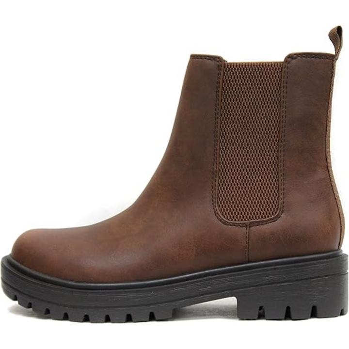 Smooth black faux leather women's Chelsea ankle boots, a versatile and chic option for sophisticated fall fashion.