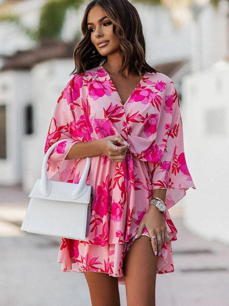 Look chic & confident in this elegant women's mini dress, a flattering summer party style.