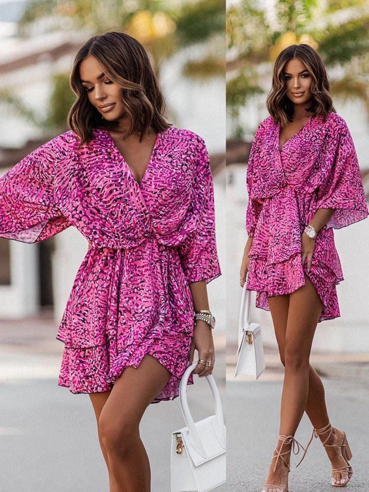 A chic V-neck mini dress for women, short and elegant, perfect for summer casual or party fashion.