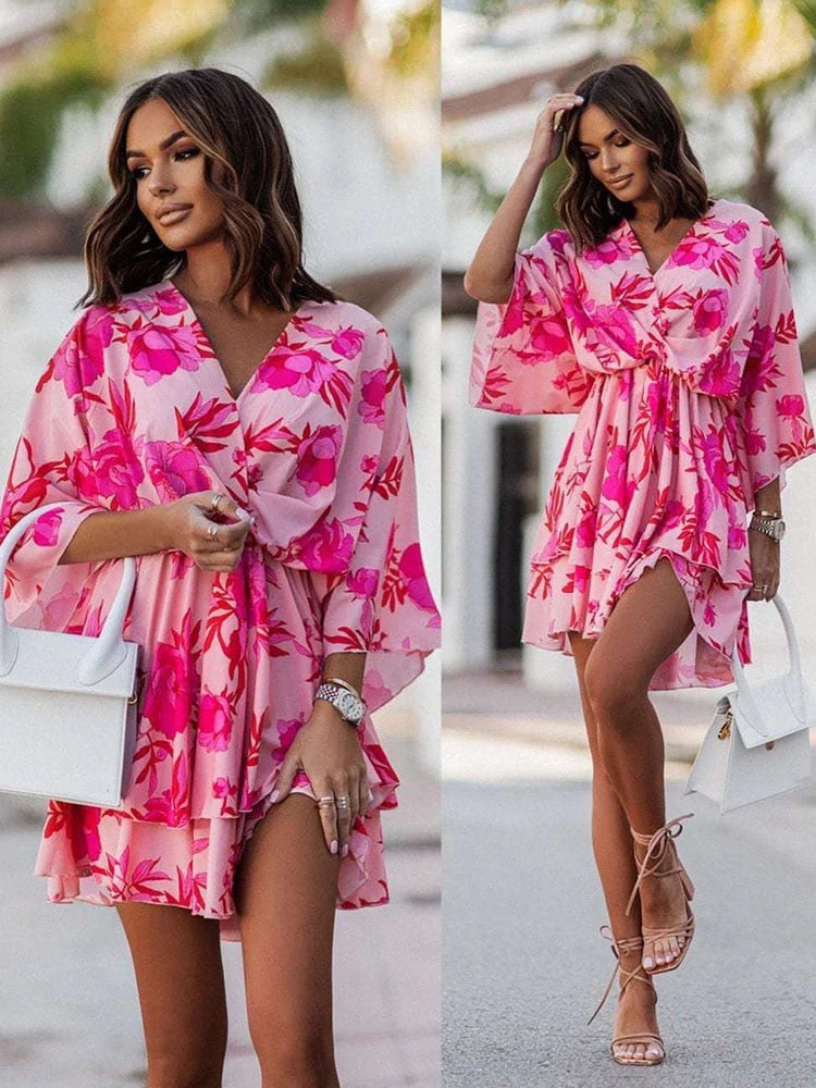 Short women's summer mini dress with a chic V-neck, ideal for elegant casual or party events.