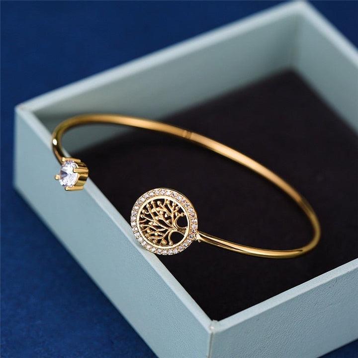 Women's adjustable Tree of Life bracelet, elegant metal accessory, spiritual jewelry gift for harmony.