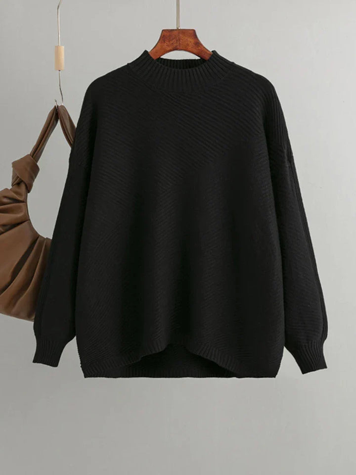 Classic women's knit jumper, oversized fit, warm ribbed design, essential for fall & winter fashion.