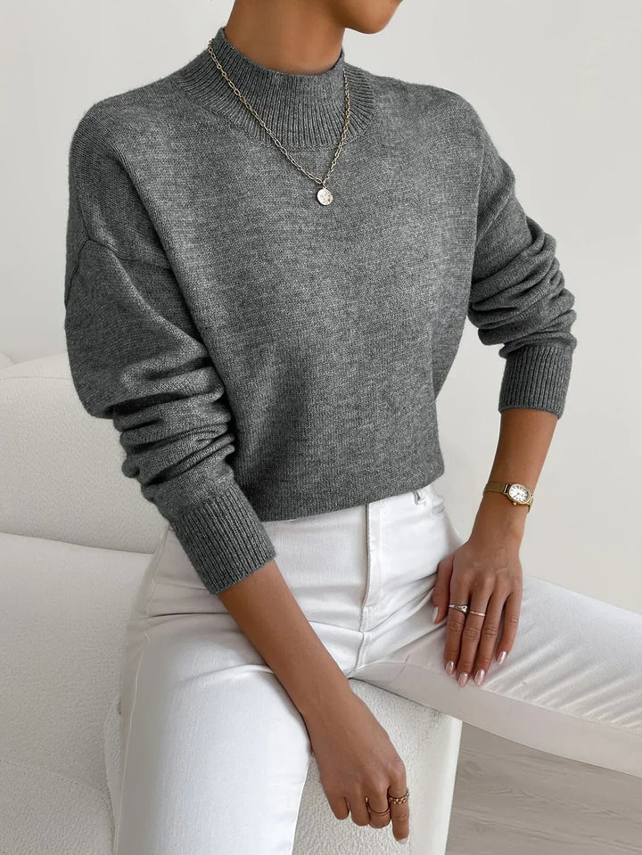 Elegant women's Cleo mock turtleneck long sleeve sweater. Cozy, relaxed fit for sophisticated fall & winter style.