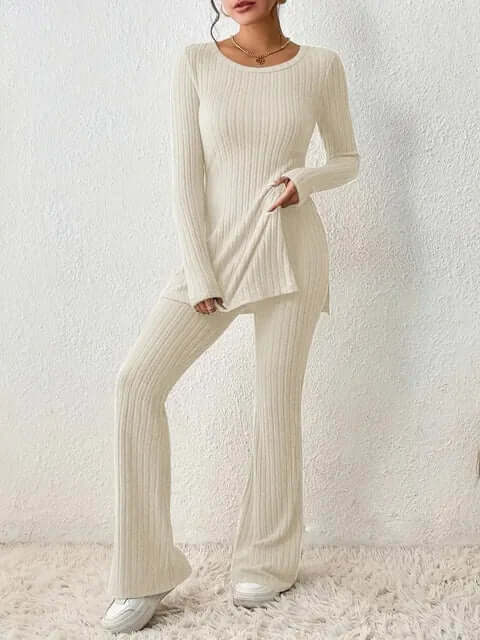 Chic women's matching set: long sleeve top and comfortable flared trousers for an elegant casual look.