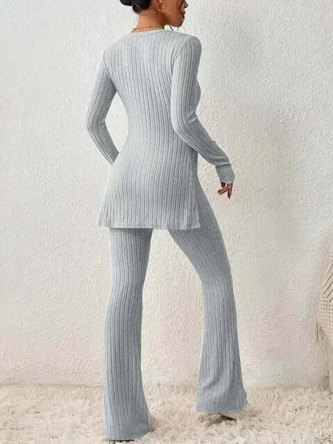 Women's casual yet elegant two-piece set: a long sleeve top and flared high-waist trousers.