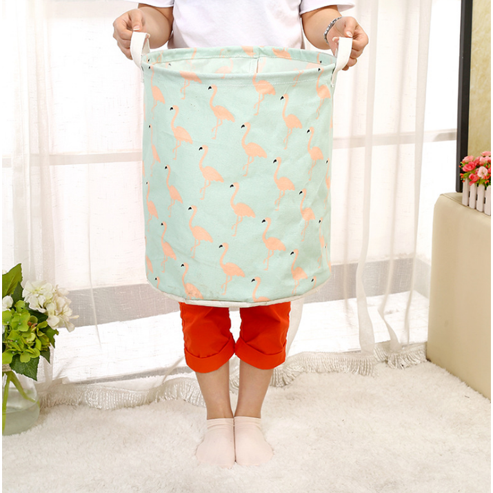 Modern collapsible laundry hamper with handles, a sleek home organization and storage solution.