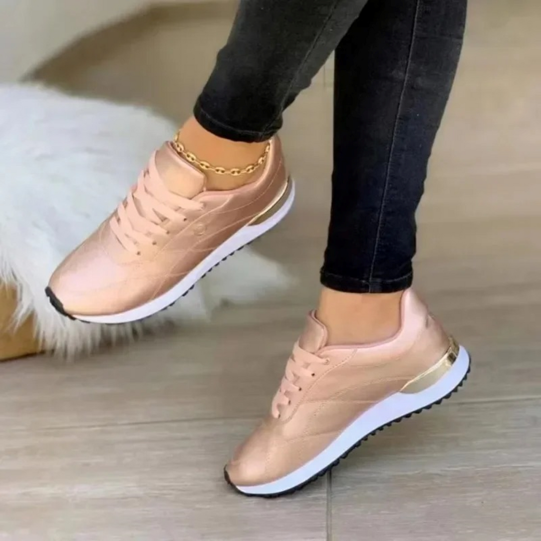 Chic Celia women's fashion sneakers. Comfortable leather walking shoes, ideal for stylish everyday casual wear.