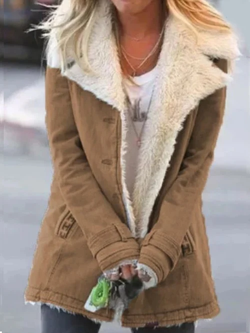 Warm women's winter coat, Celeste. Insulated outerwear for extreme cold weather, active outdoor style.
