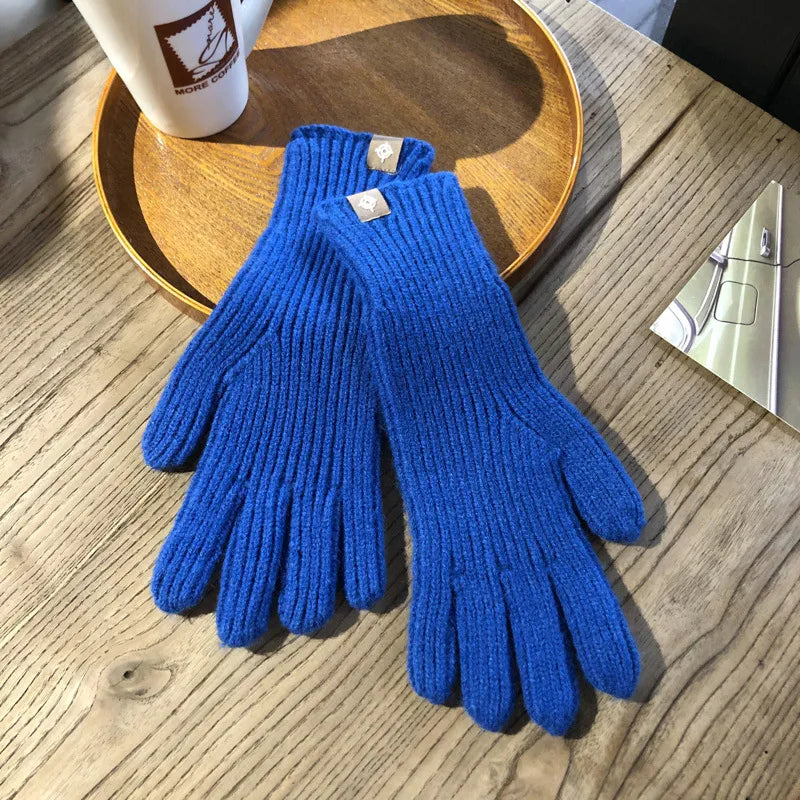Stylish ladies' warm winter gloves with touchscreen compatibility.