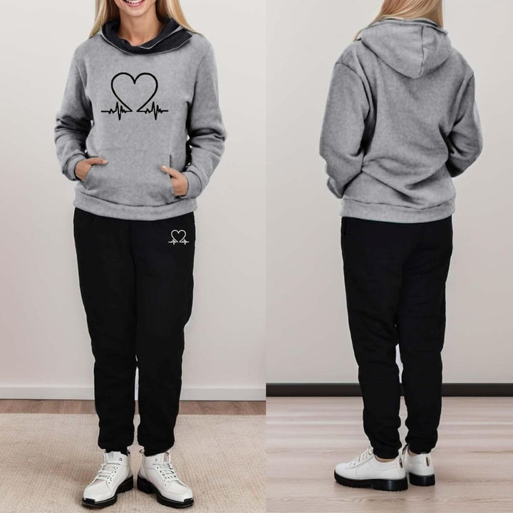 Active wear women's tracksuit in a cozy WARMFLEX blend. Perfect for everyday style.
