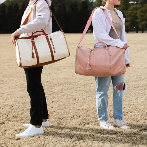 Luxury compact carry-on duffel bag with wrinkle-free garment section. Unisex travel essential.