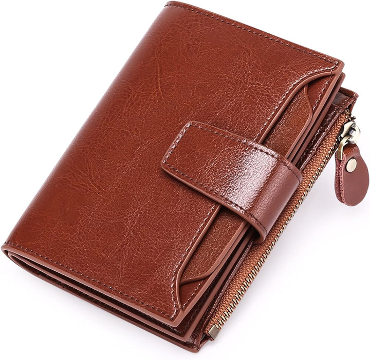 Secure women's RFID blocking leather wallet, compact design for cards, cash, & coins.