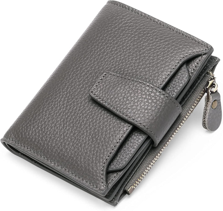 Practical women's compact leather wallet, RFID shielding for cards and easy coin access.