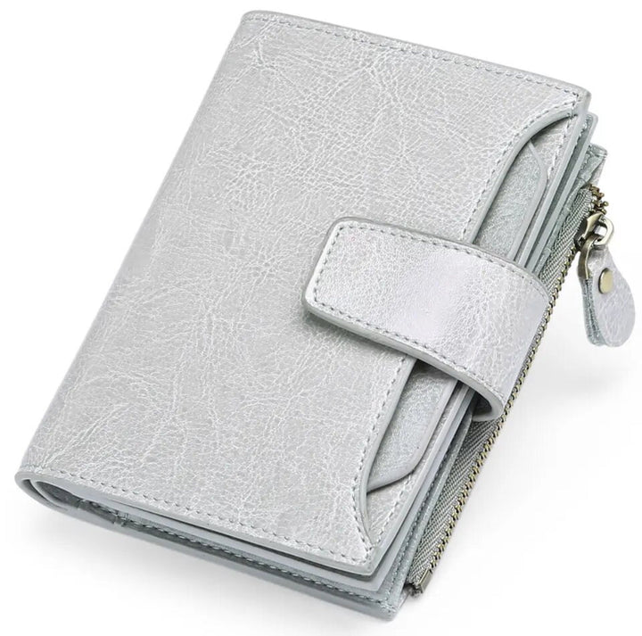 Convenient women's compact leather wallet, RFID blocking, ideal for cards, ID, & coins.