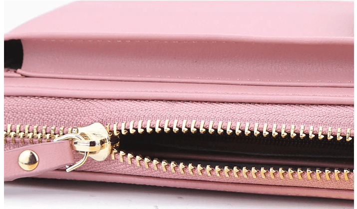 Women's stylish faux leather crossbody purse with shiny gold-tone hardware details.