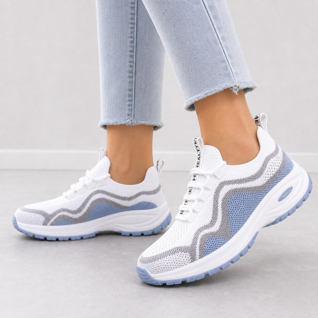 Stylish women's Cora lace-up walking shoes, combining comfort & athletic design.
