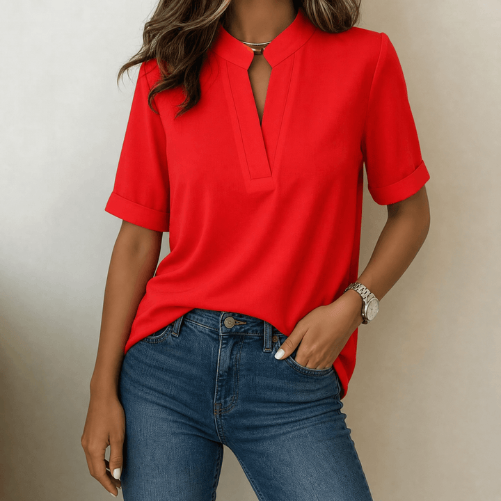 Stylish spring women's V-neck short sleeve blouse. Relaxed fit v-neck top for fresh, everyday fashion.