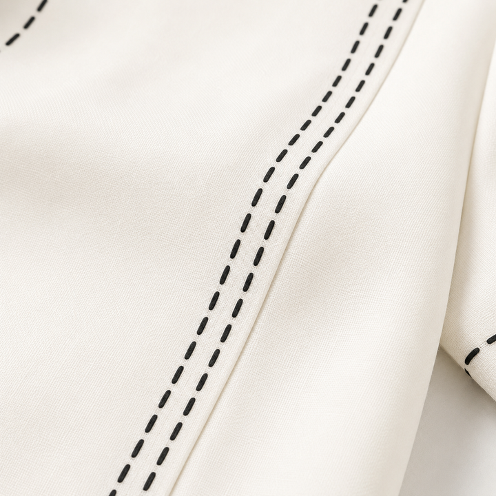 Versatile women's short sleeve top with Henley design and playful stripe detail.