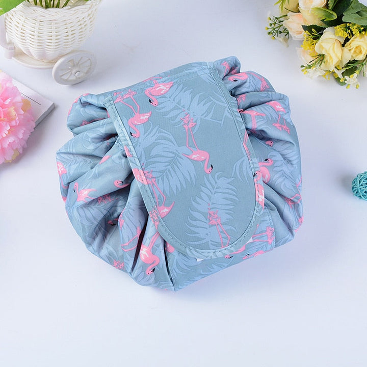 Women's travel toiletry bag with drawstring. Keep cosmetics organized & secure.