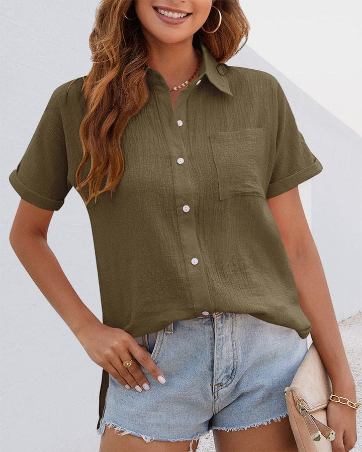 Stylish women's short sleeve button blouse, a versatile cotton top suitable for casual wear or smart office outfits.