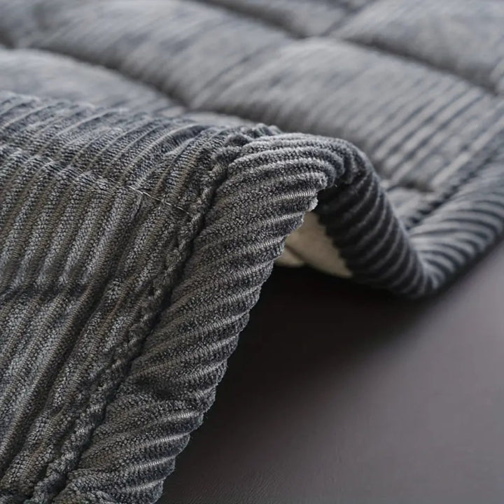 Durable quilted furniture protector, a non-slip microfibre couch cover for homes.