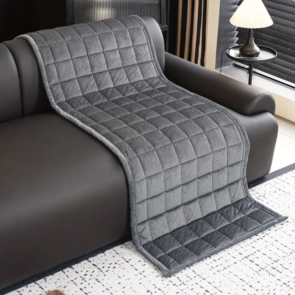 Elegant quilted sofa protector & slipcover, non-slip microfibre for complete furniture shield.