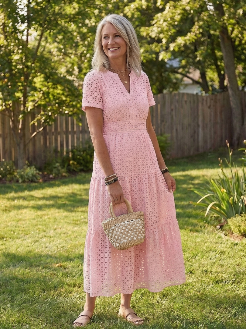 Women's pink tiered midi dress. Stylish, comfortable short-sleeve summer sundress.