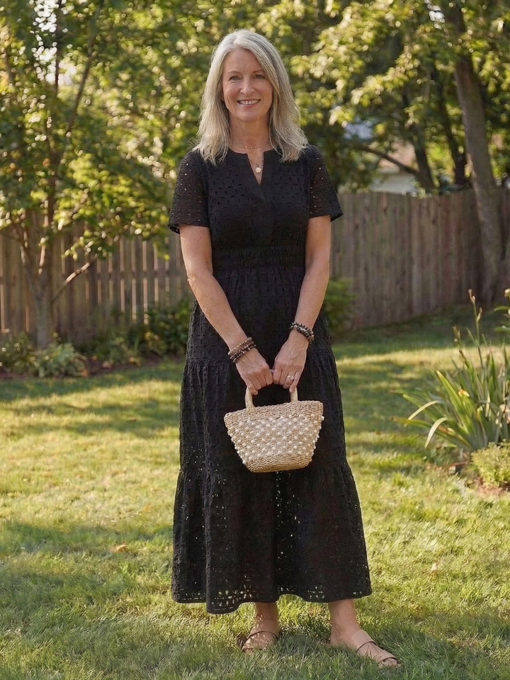Comfortable beige tiered midi dress for women. Elegant short-sleeve sundress.