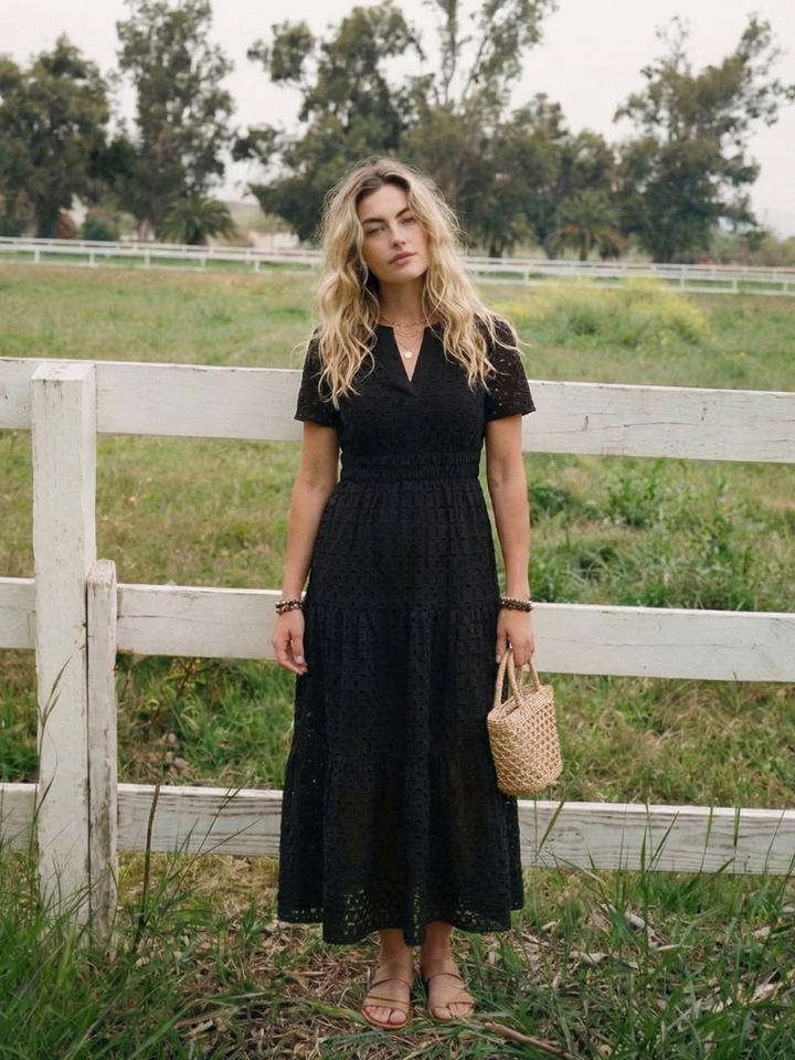 Short-sleeve women's pink tiered midi dress. Effortlessly comfortable for summer.