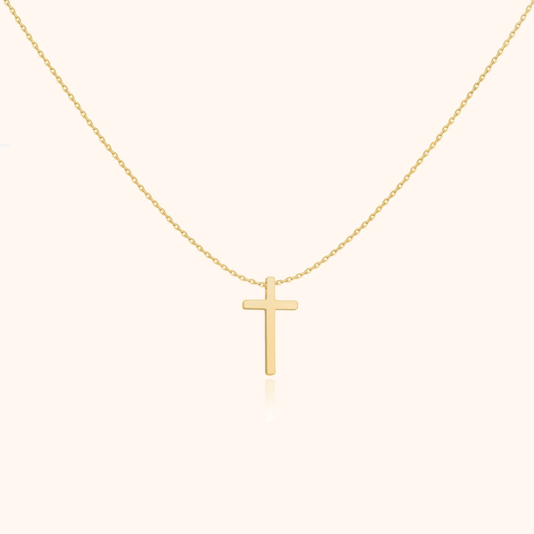 Dainty gold-plated sterling silver women's cross pendant necklace. Elegant spiritual faith jewelry, ideal gift for her.