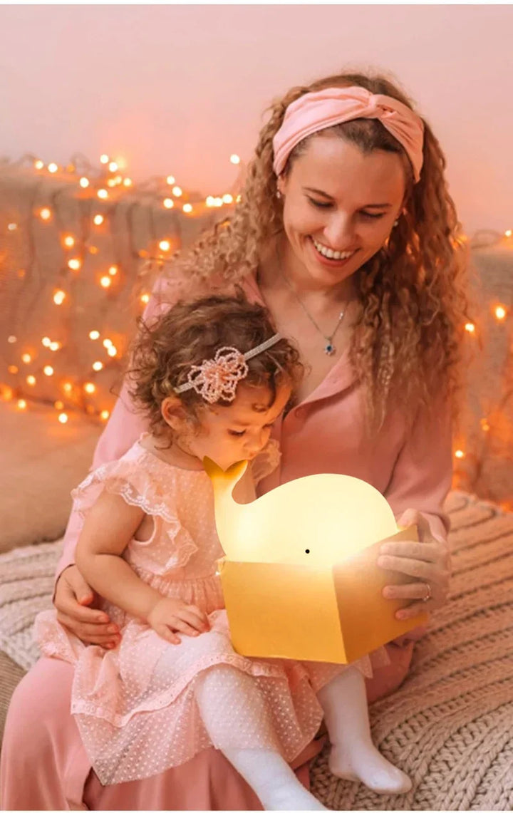 Adorable whale night light, a perfect toddler gift. Easy-to-use color-changing lamp for a playful children's room.