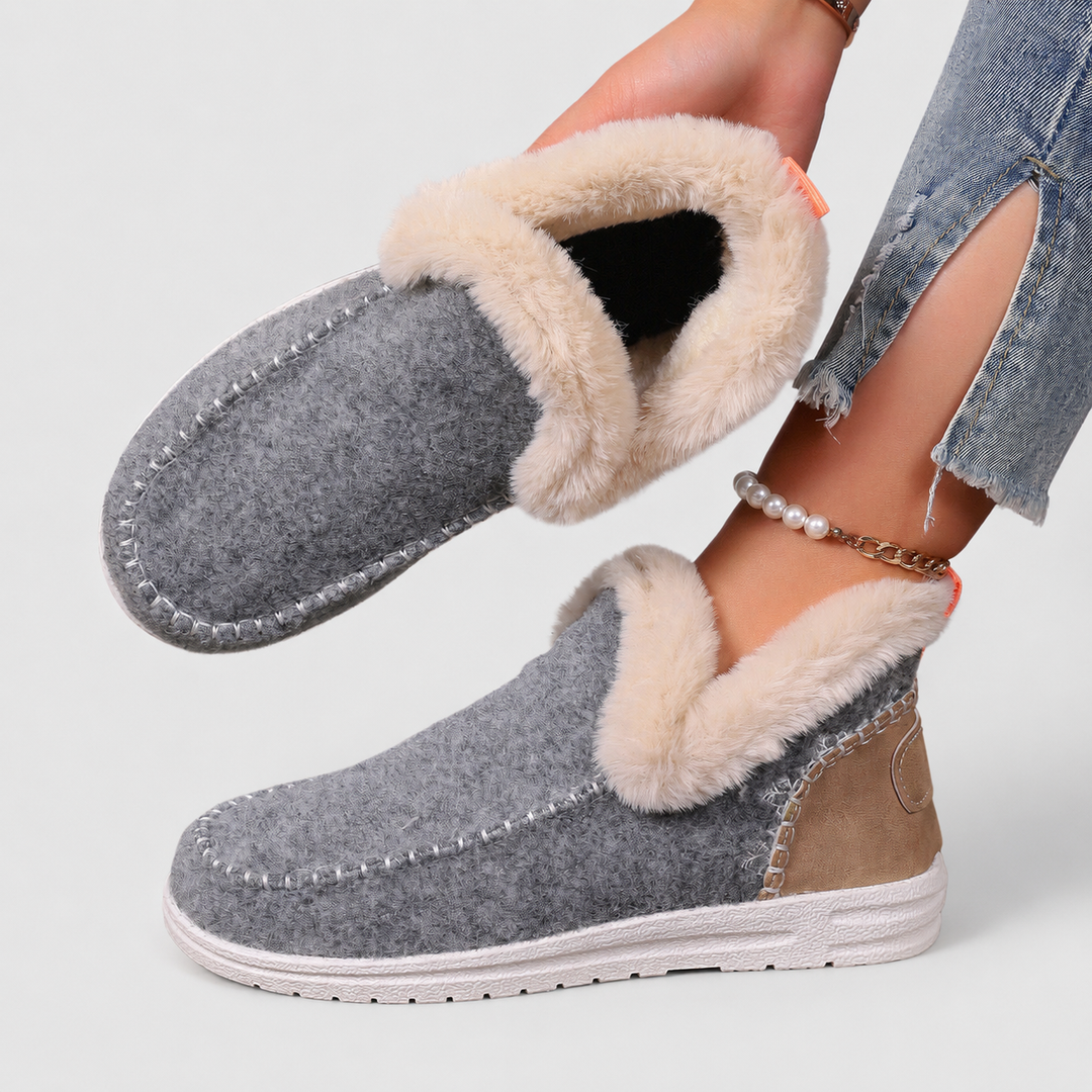 Women's orthopedic house slippers for cozy comfort. Warm, supportive indoor footwear for loungewear.