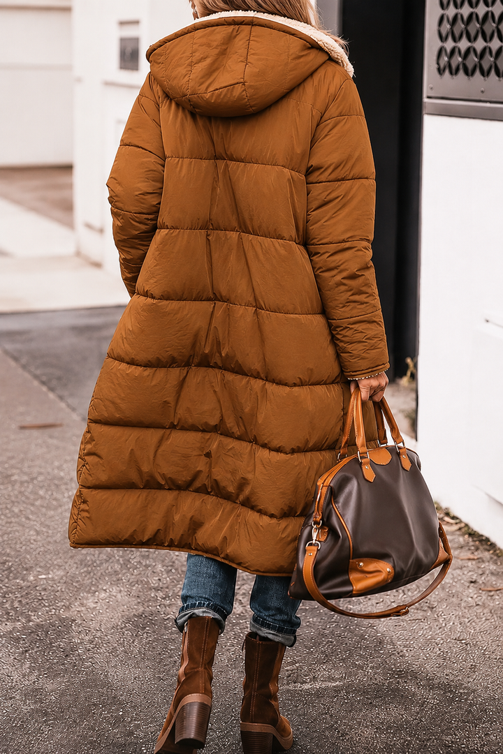 Black and gray reversible women's fur winter jacket, versatile for any cold weather outfit.