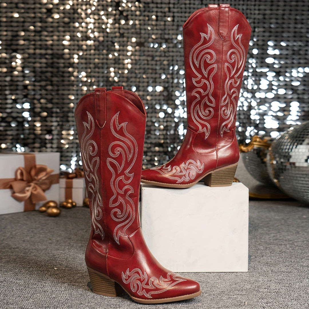 Stylish women's wide-calf knee-high cowboy boots, perfect for fall & winter fashion, with block heel.