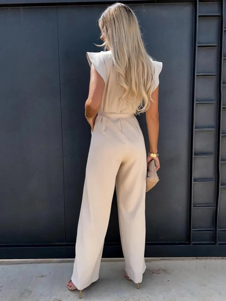 Versatile women's chic jumpsuit. Available in white, blue & black for effortless style & comfort.