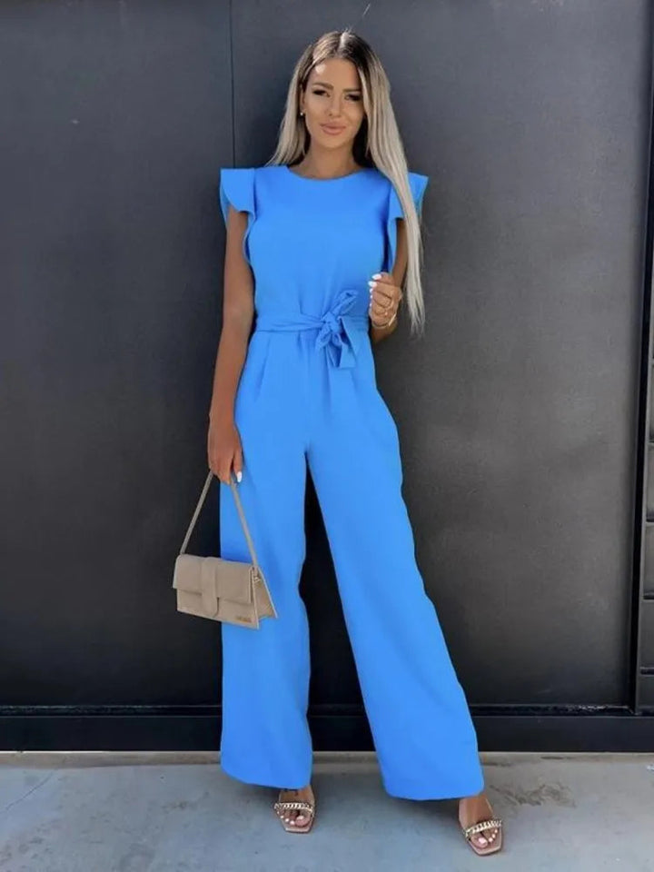 Comfortable women's chic jumpsuit in apricot. Easy care, modern design for versatile and stylish outfits.