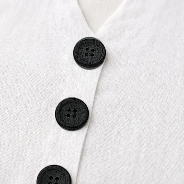 Women's casual sleeveless V-neck top, button-front design for a relaxed look.