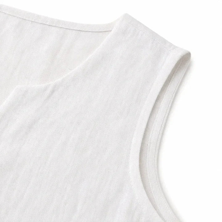 Warm weather women's tank top, V-neck, and button accents for ultimate comfort.