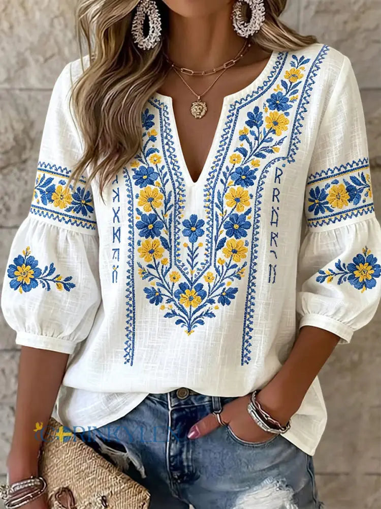 Women's embroidered boho V-neck blouse top with long sleeves, perfect for casual summer and spring fashion.